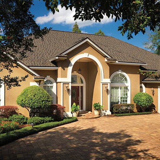 A completed DaBella roof installation on a house in which GAF roof systems products have been used