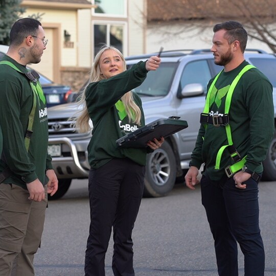 Dabella roofing employees on site during a home roof restoration