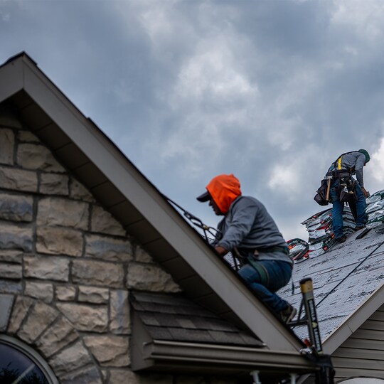 Feazel Roofers installing GAF shingles on a home
