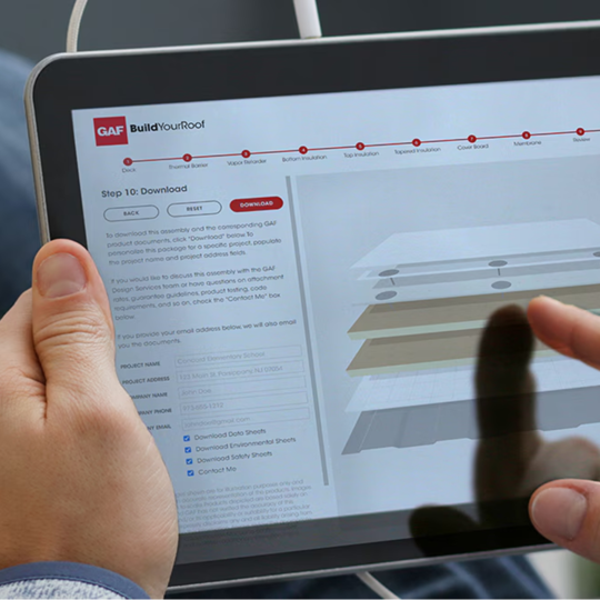 Aerial shot of GAF certified contractors doing a roof walkthrough.