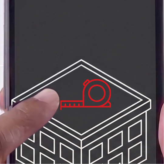 A user entering approximate building size on a smartphone screen to drive roof cost and efficiency calculations.