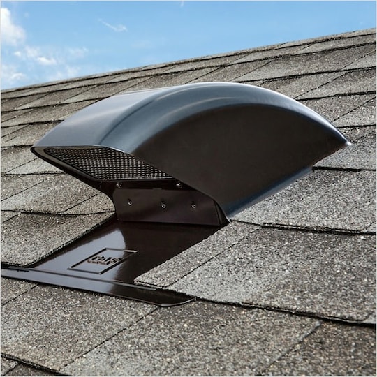 Sideview of a black Master Flow Bath and Dryer Vent from GAF on a brown shingled rooftop