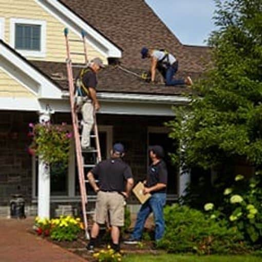 Roofing cotractors installing GAF roof shingles