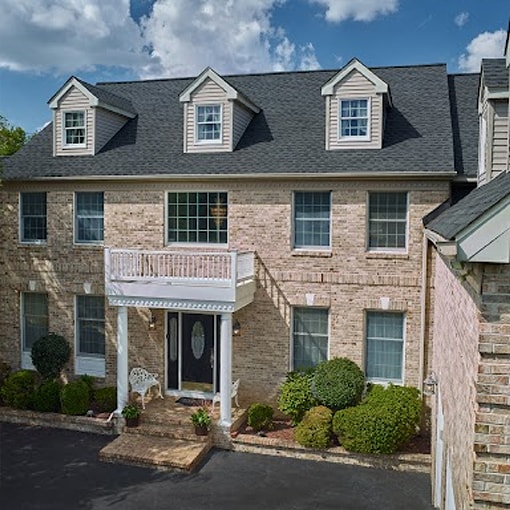 Brick home with Timberline® AS II class 4 shingles