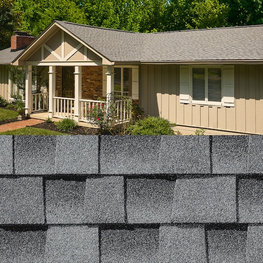 GAF Timberline HDZ® Oyster Gray Shingle closeup with sample product image on a beige house.