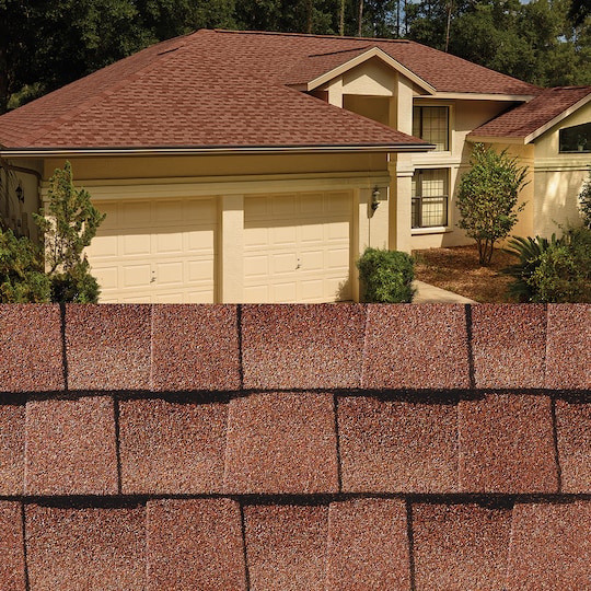 GAF Timberline HDZ® Sunset Brick Shingle closeup with sample product image on a beige house.