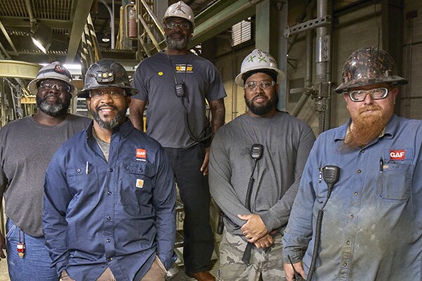 GAF employees working in American manufacturing plant