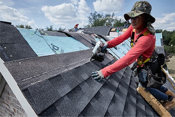 A GAF certified roofer installing a Fortified roof