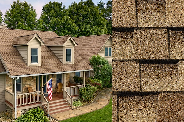 GAF Timberline HDZ® Shakewood Shingle closeup with sample product image on a light brown brick house.