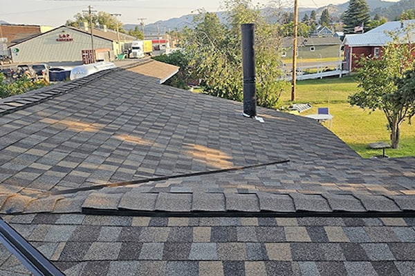 Aerial view of a complete DaBella roof installation from a google review dated October of 2024