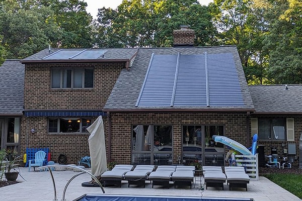 A homeowners photo of a new GAF Energy Timberline Solar® Roof system on their home