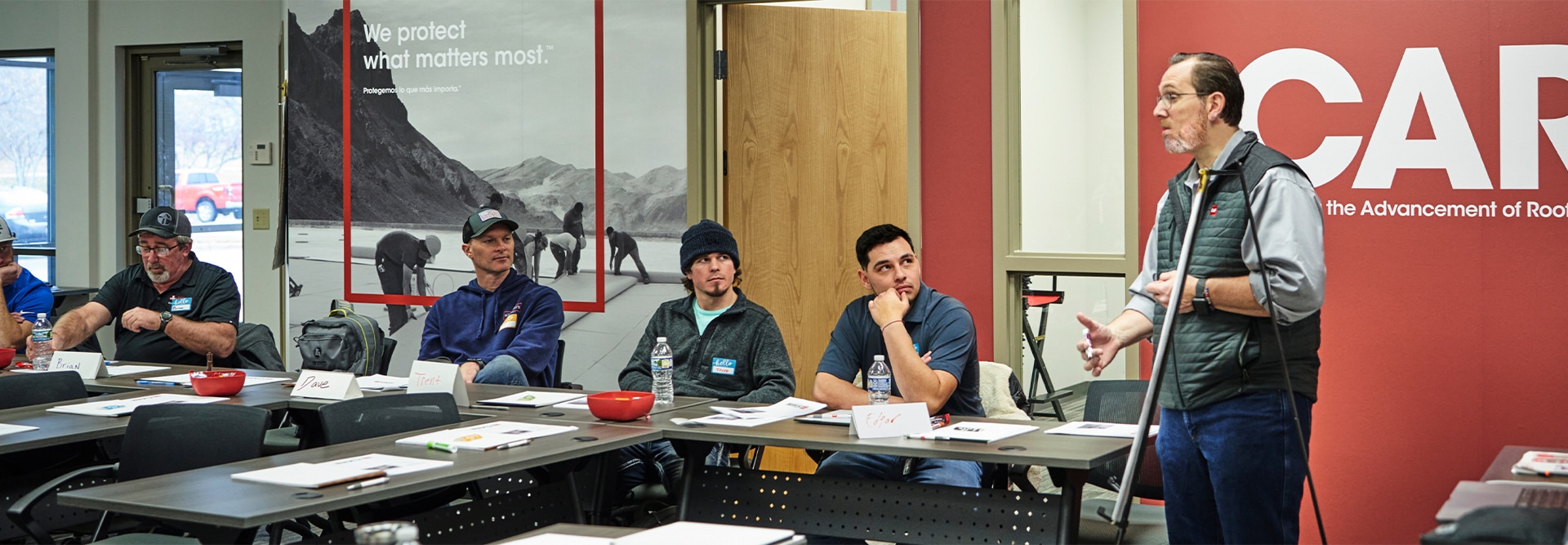 GAF CARE Contractor training center leading a roofing class