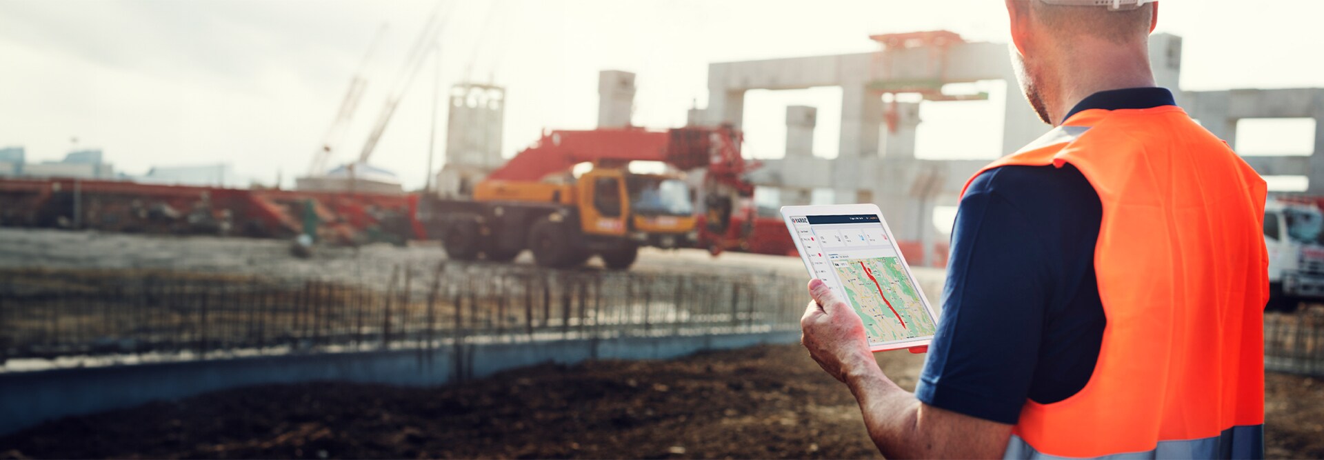 A contractor using YARDZ software on a tablet