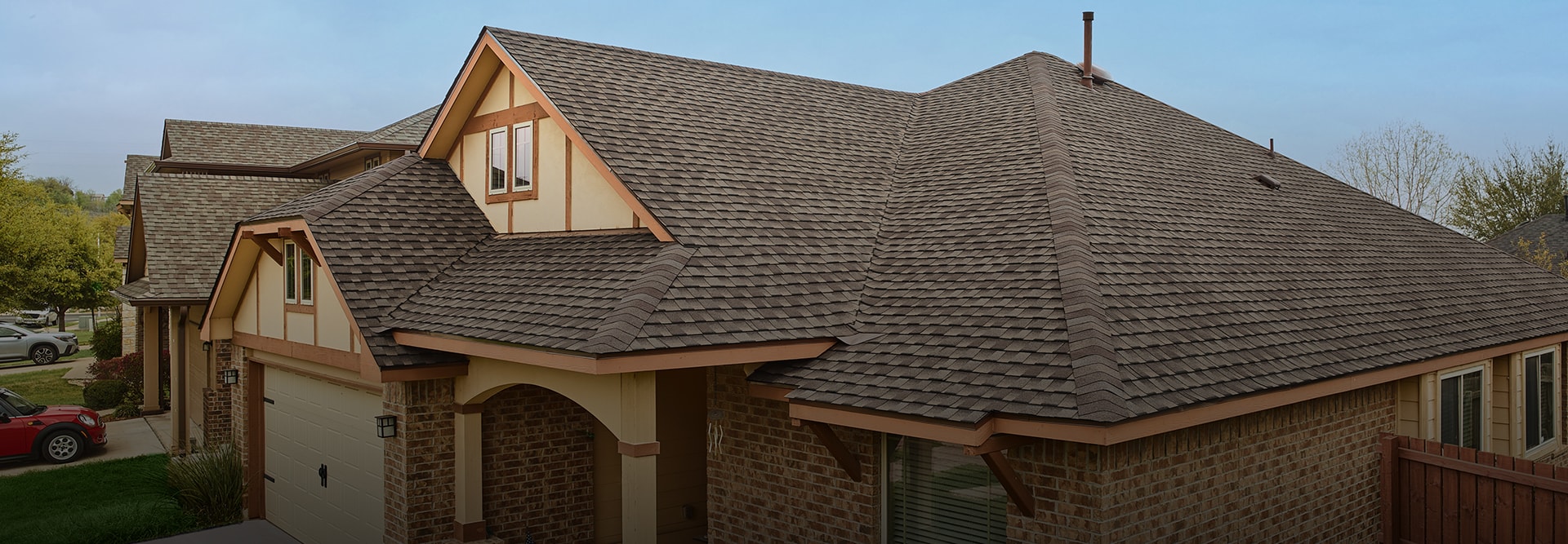 Residential home with Barkwood shingles made by GAF