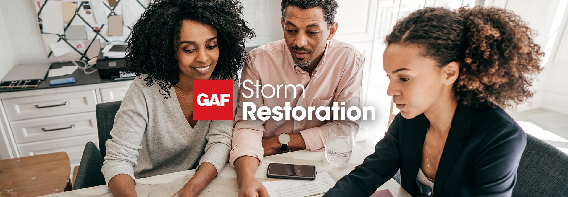 An insurance carrier representative and homeowners discuss how to handle a storm restoration claim after a storm.