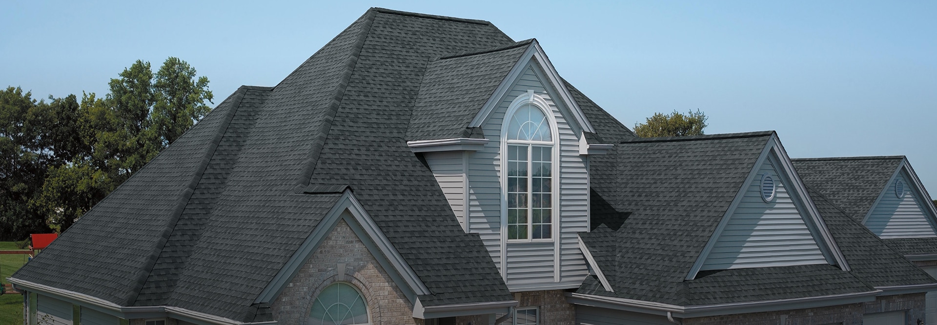 Residential home with Pewter Gray shingles made by GAF