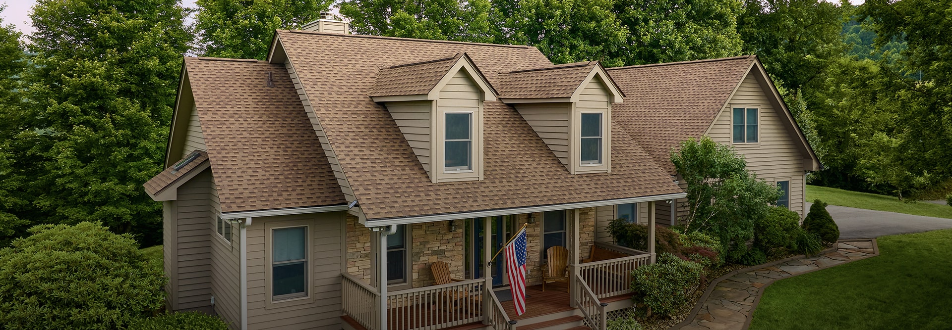 Residential home with Shakewood shingles made by GAF