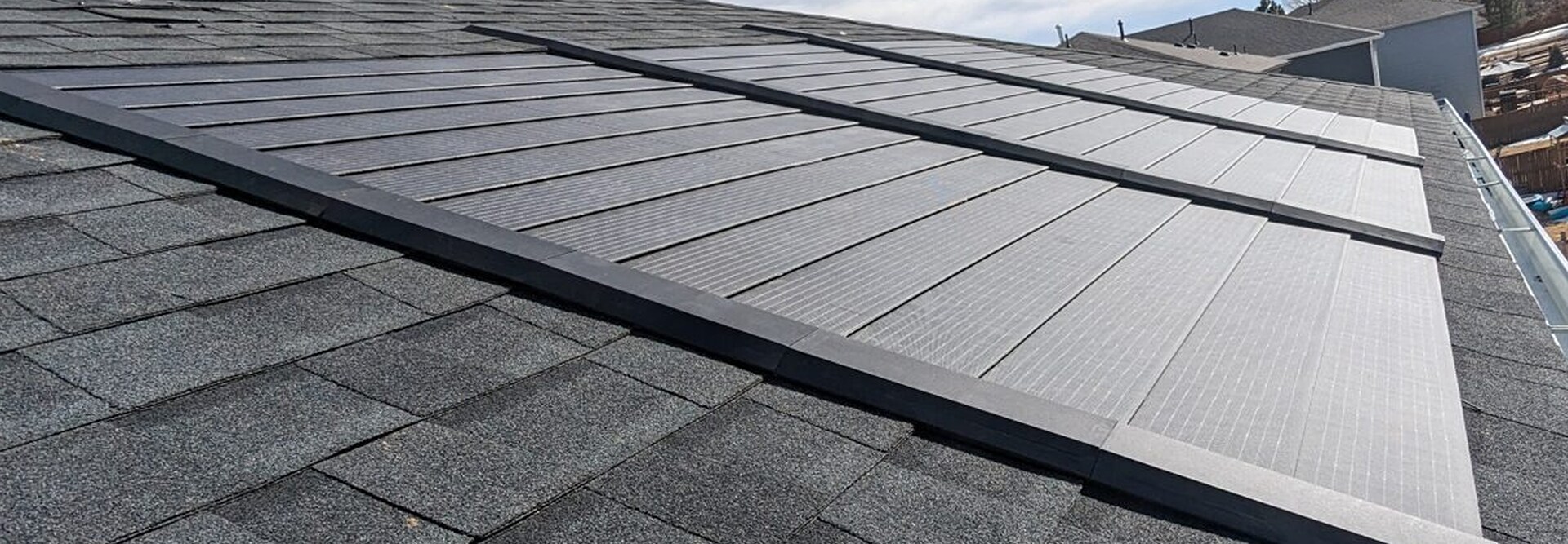 Timberline Solar tiles installed on an asphalt shingle roof by Meritage Homes. 