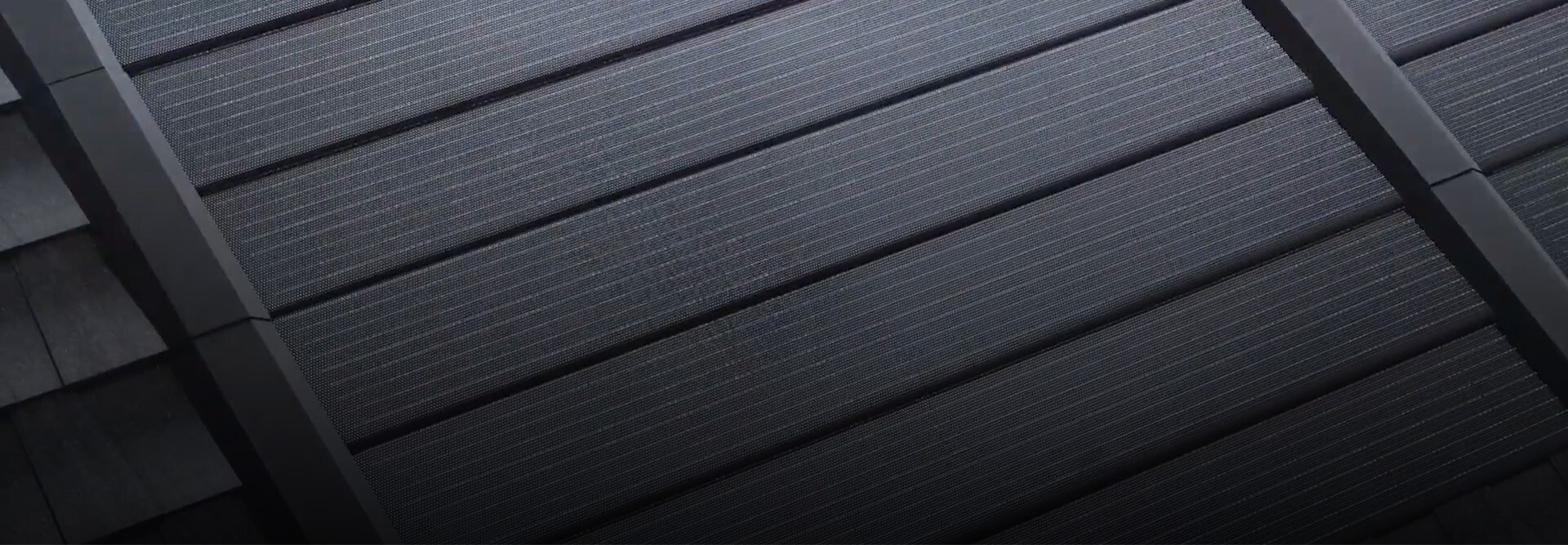 Closeup photo of solar tiles that are part of the Solar Timberline Roofing System. 