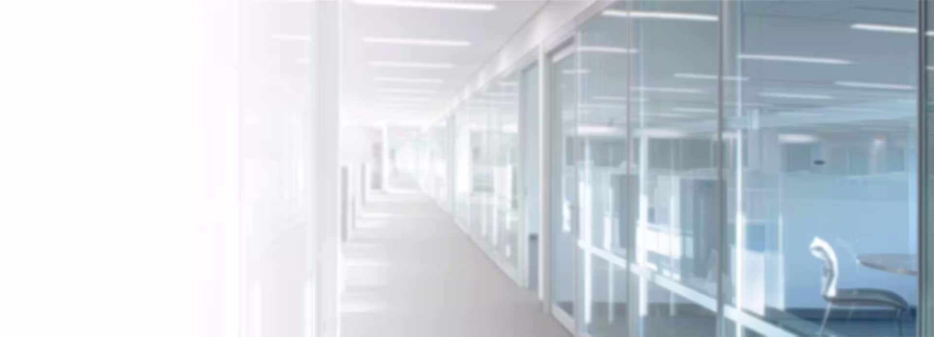 Blurred office hallway with doors