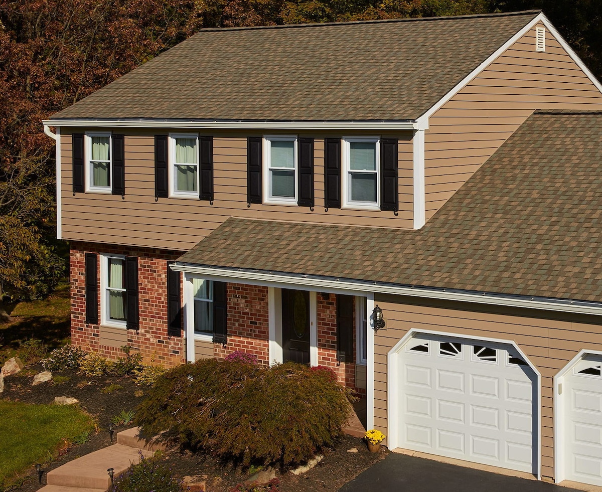 Beige home with Fortitude roofing shingles