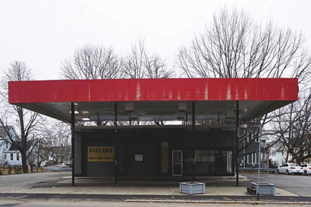 Before picture of a gas station in Portsmouth, NH that was retrofitted into The Getty Bagel Shop.