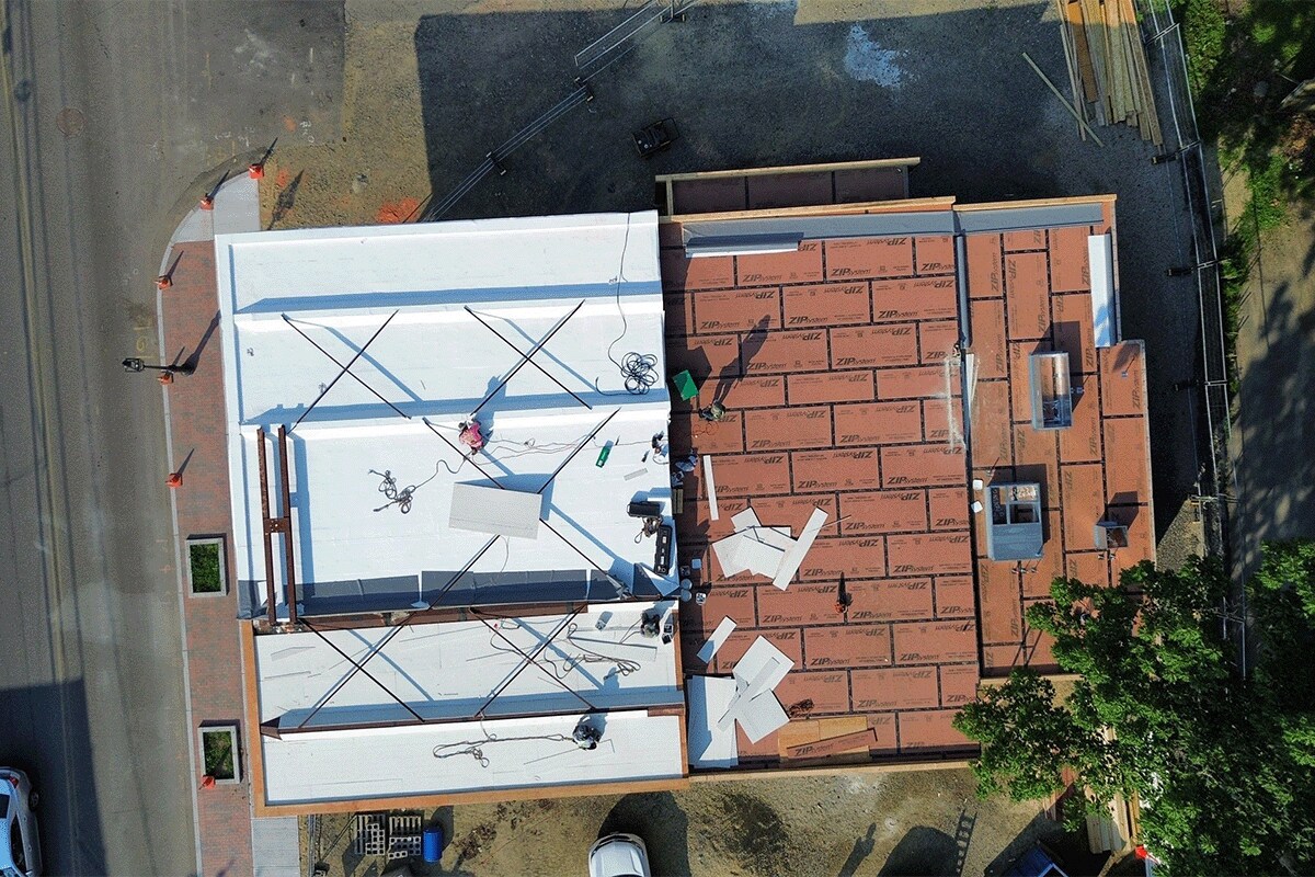 GAF roofing contractors installed a new roofing system with chemical resistance on the Getty Bagel Shop in Portsmouth, NH.