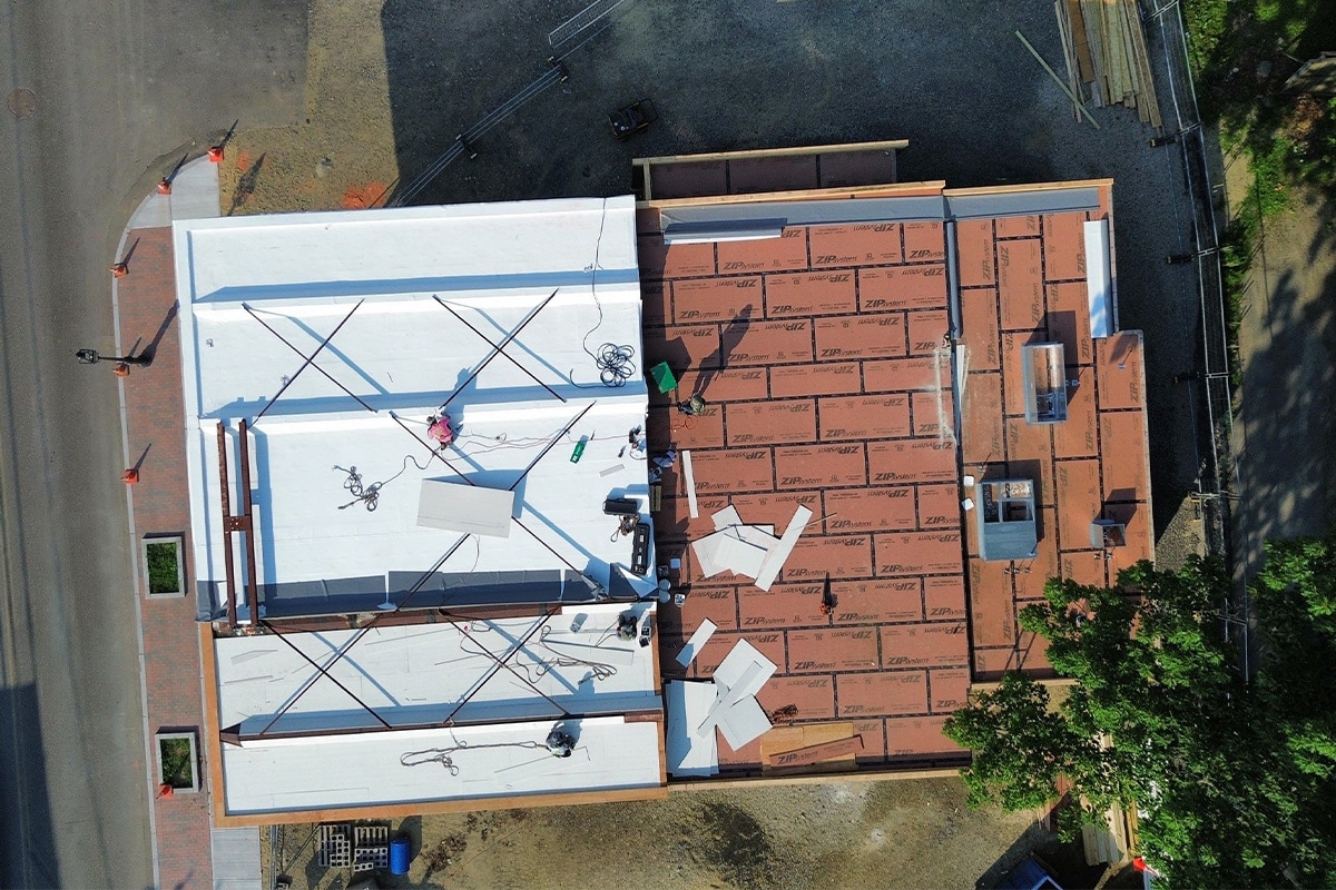 GAF roofing contractors installed a new roofing system with chemical resistance on the Getty Bagel Shop in Portsmouth, NH.