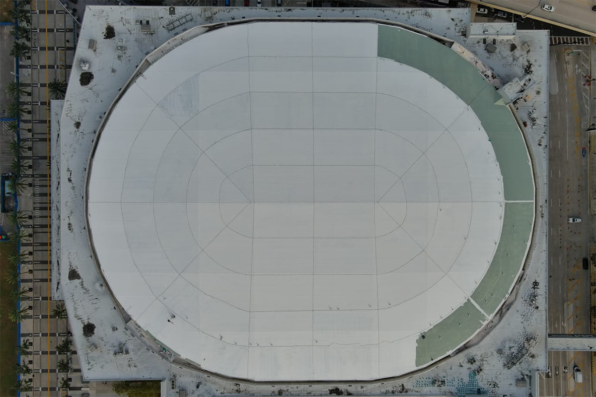 RMS Orlando roofing contractors installing new GAF roofing materials at the Kia Center.