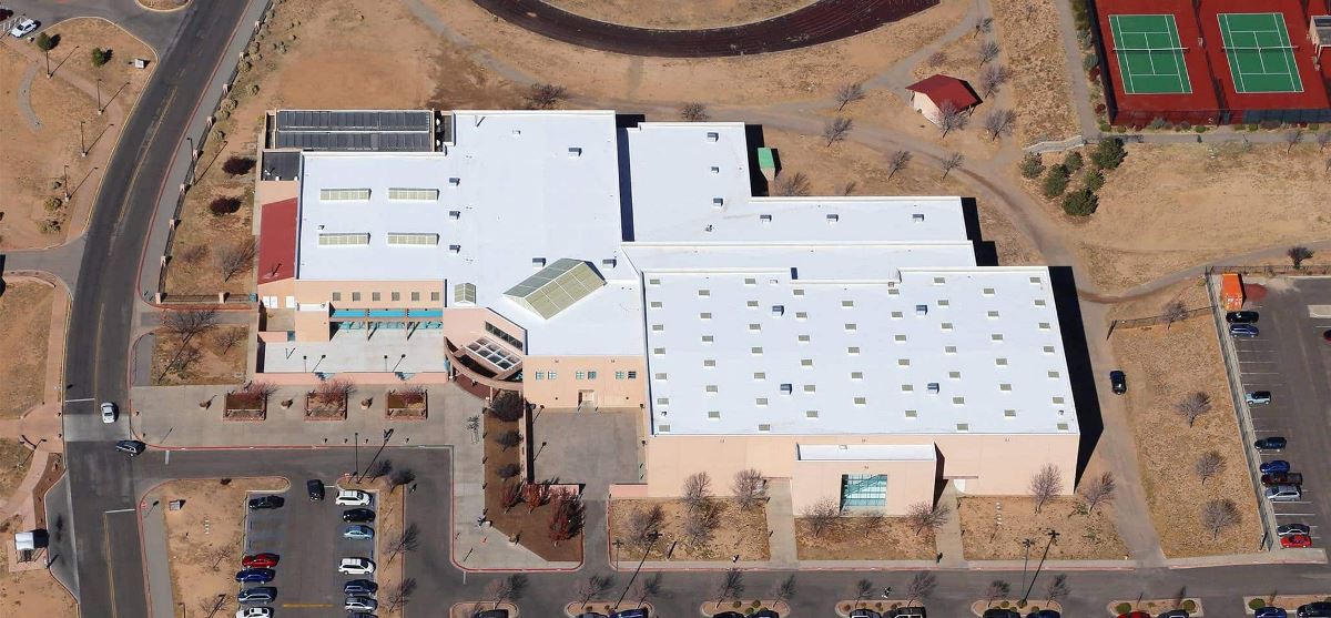 Aerial view of Santa Fe Community College building with a newly coated flat roof