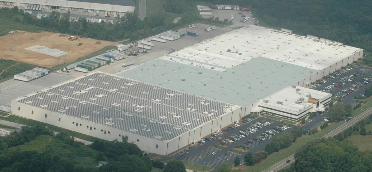 Side aerial view of Shoe Show Inc in NC with a new commerical roof coatings