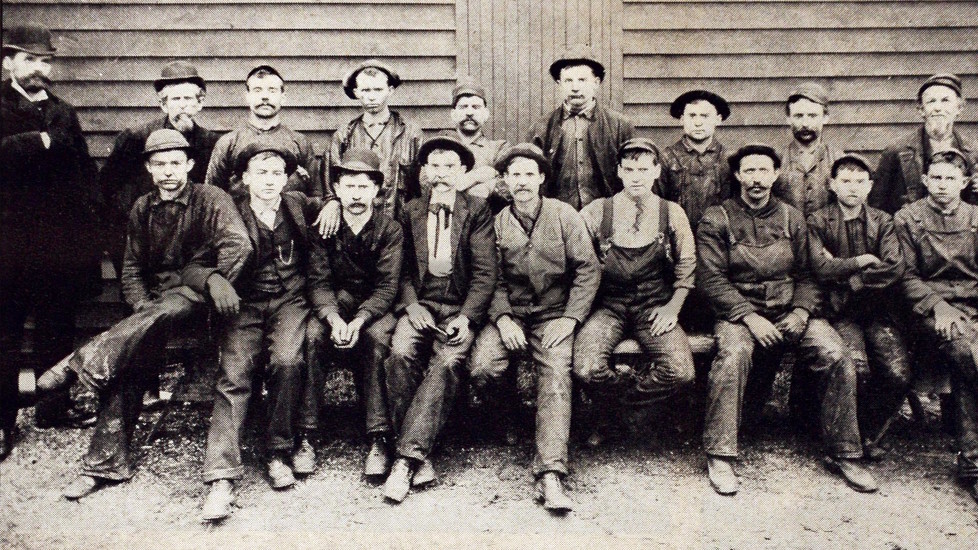 Historical photo of Standard Industries employees