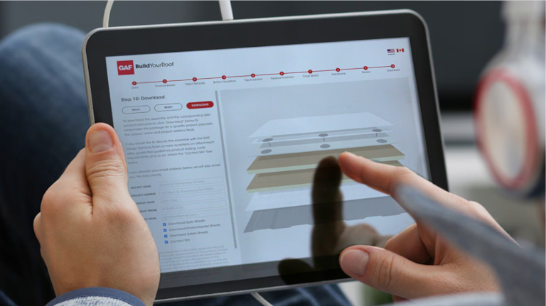 Person selecting roof system components using BuildYourRoof design tool on a tablet.