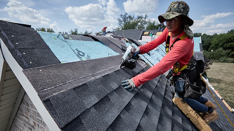 Roofing contractor using ring-shank nails required in a Fortified roofing system