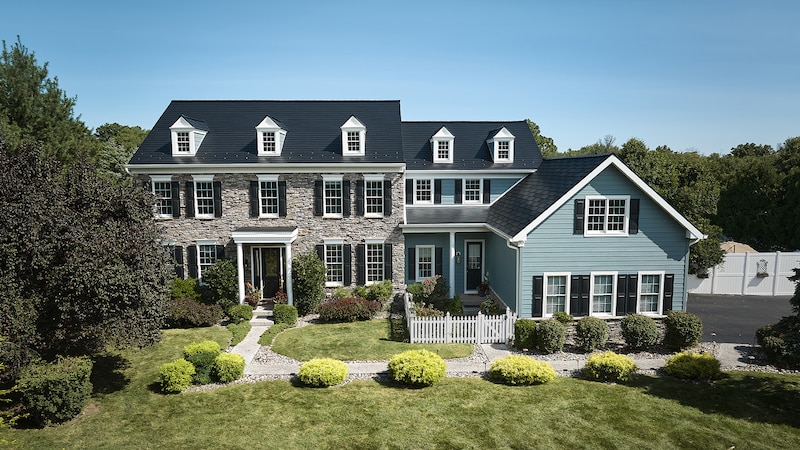 TimberSteel™ Premium Metal roofing system on a featured home