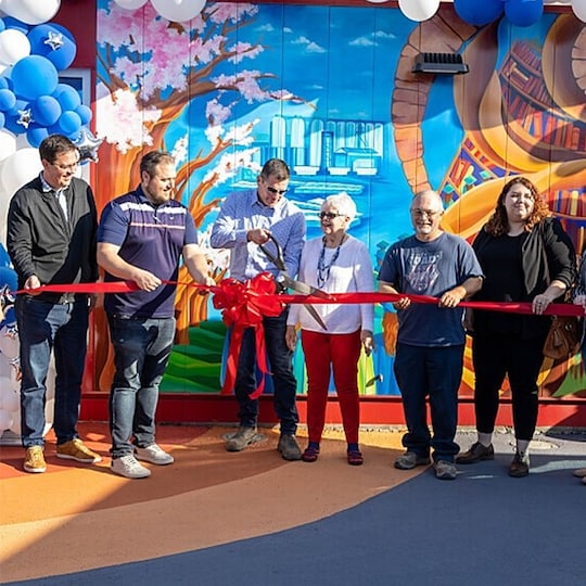 GAF volunteers posting in front of the Shaft Learning Center