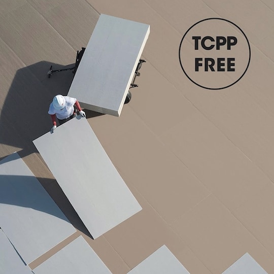 GAF Energy employee installing TCPP free insulation