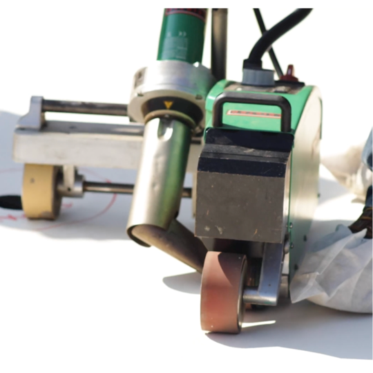 Close up image of a welder machine used for the TPO membrane installation. 