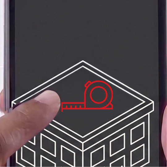 A user entering approximate building size on a smartphone screen to drive roof cost and efficiency calculations.