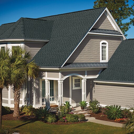Home with dark gray Timberline HDZ RS roofing shingles