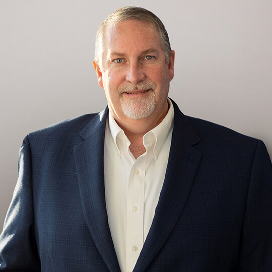 Headshot of Justin Dunlap,  President, Specialty Products & Services