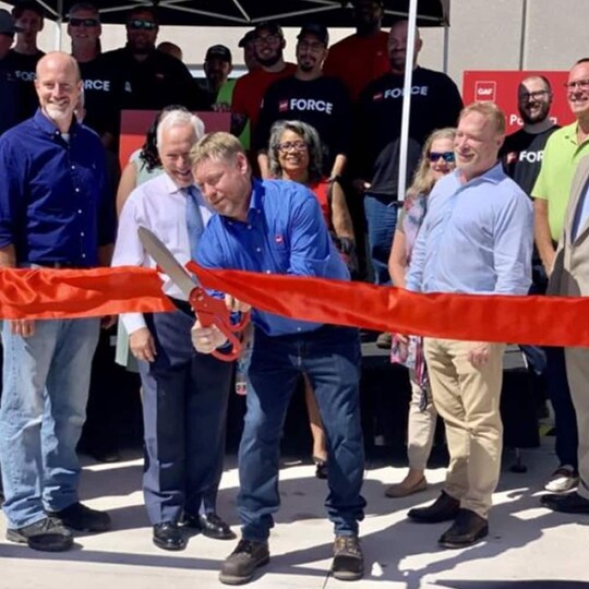 GAF employees at ribbon cutting for local distribution center