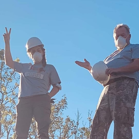 Veterans who are GAF employees in their Team Rubicon greyshirts.