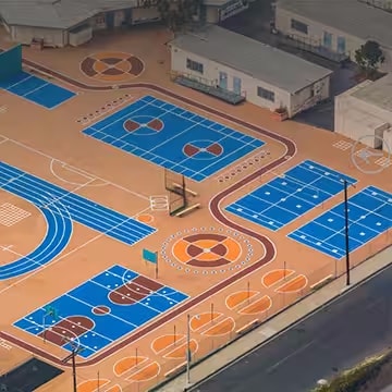 Vibrant colors of the play areas with StreetBond transform neglected community spaces while cooling the asphalt.