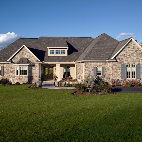 Stone house with GAF shingles