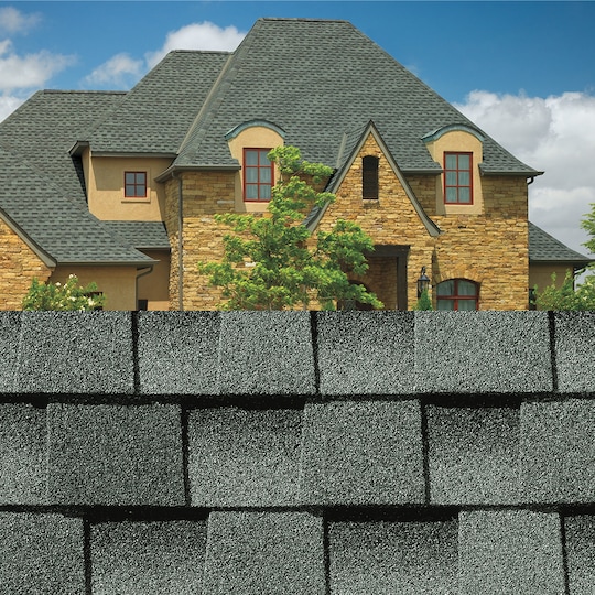 House with Timberline HDZ® Shingles and a close up of a Timberline HDZ® Shingle in Slate.