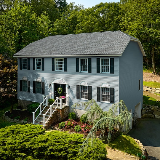 House with Timberline HDZ® Shingles in the color Pewter Gray.