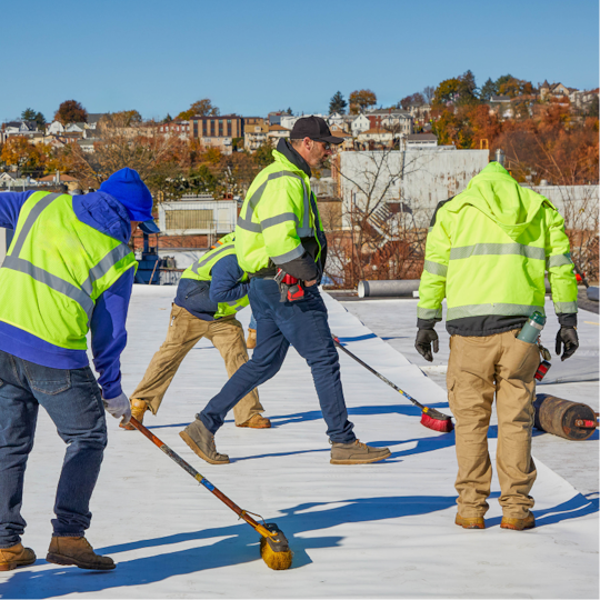 Commercial contractors on a roof