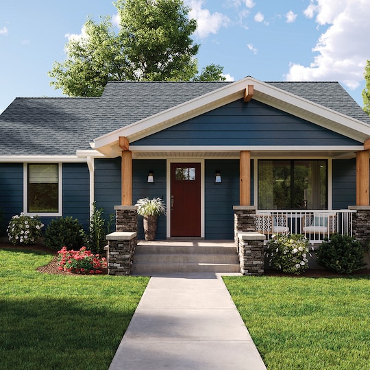 Front view of a teal-sided house with  charcoal Timberline UHDZ shingles from GAF