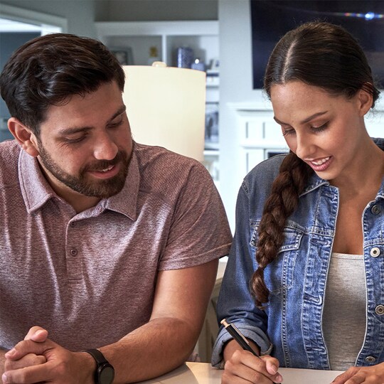 Homeowners reviewing residential warrenties